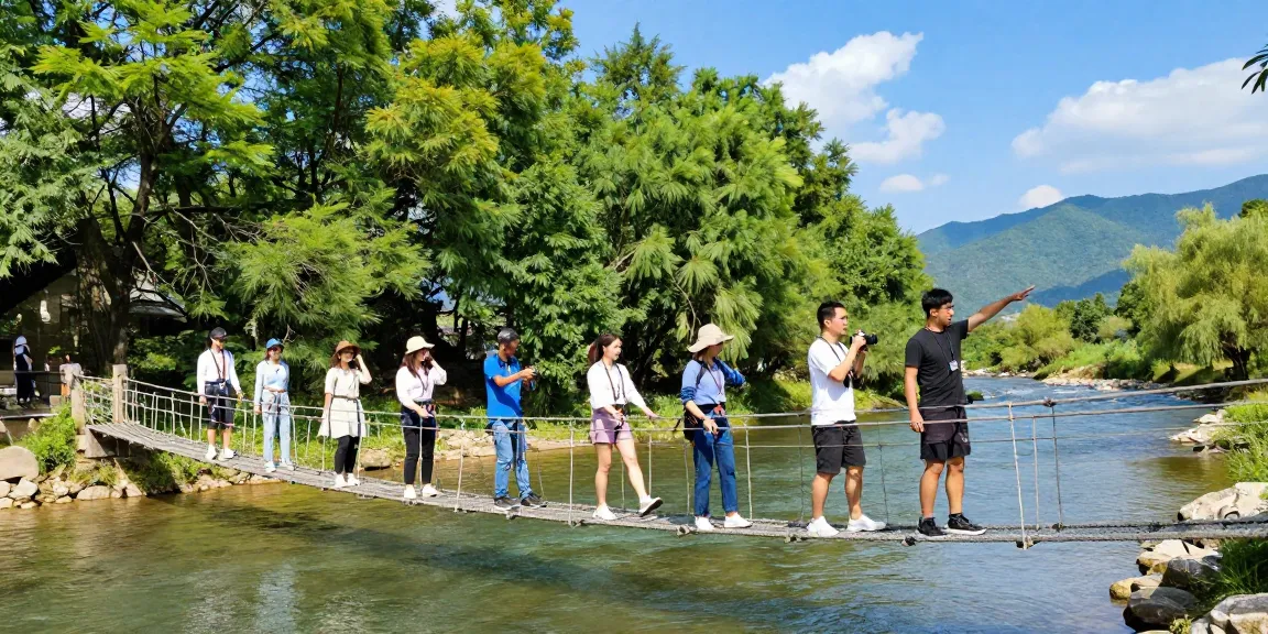 Friends crossing a river rope bridge, enjoying the scenic landscape and outdoor adventure.